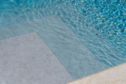 ELBE Floor Surface in Entrance Way Steps and Pool in Solid Moon